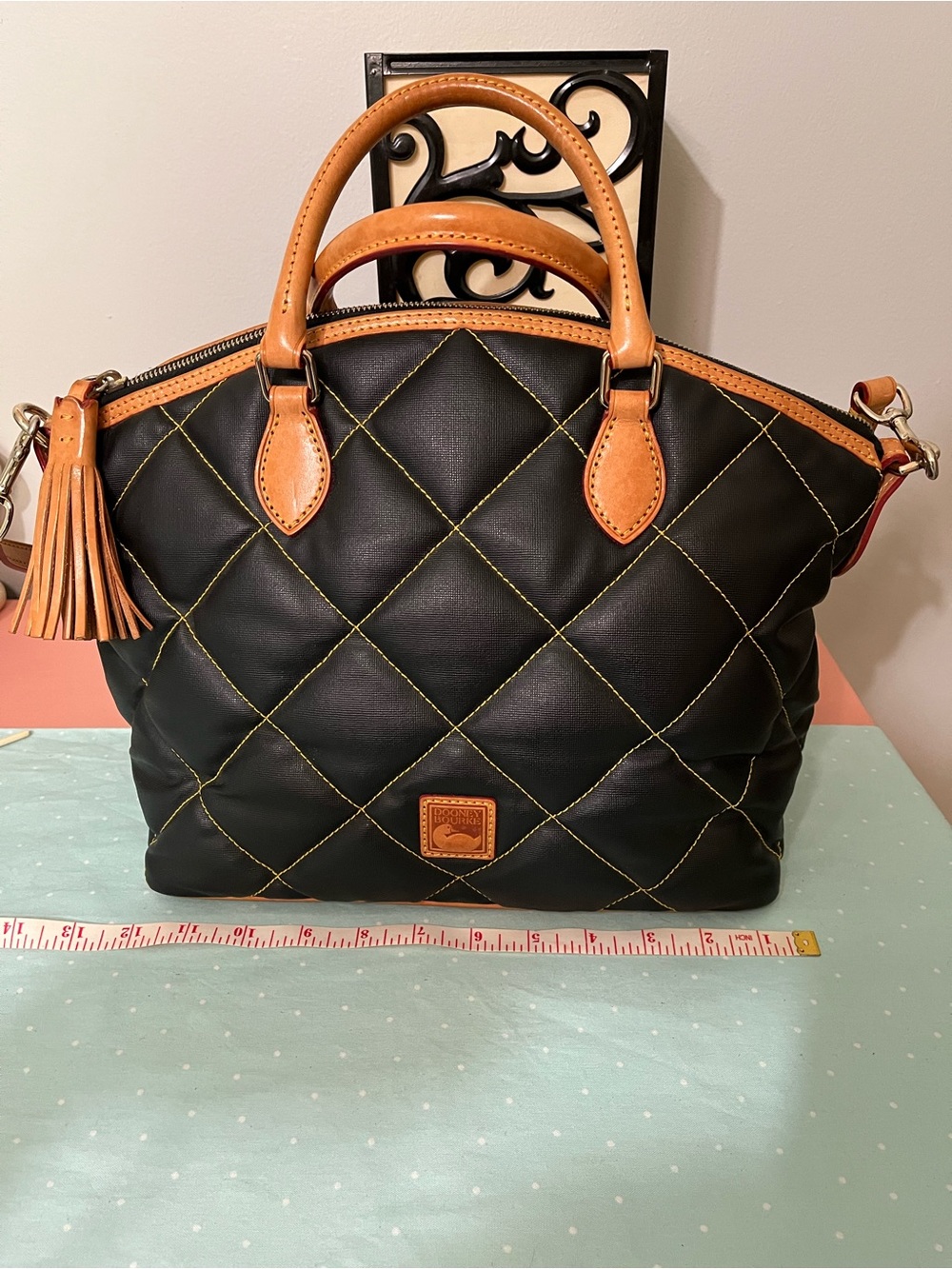 Vintage Dooney & Bourke “Spicy Collection” quilted black and tan domed satchel